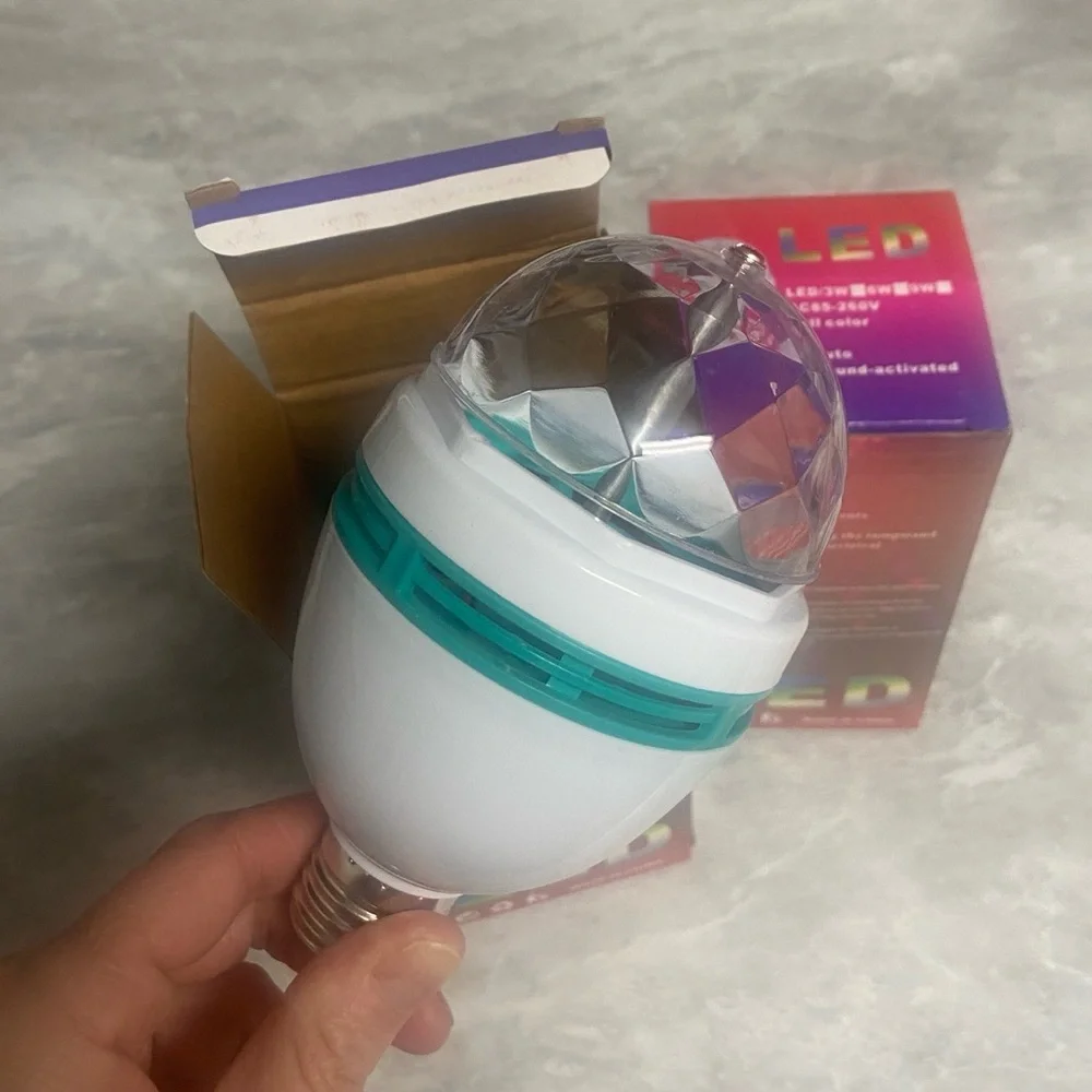 Two (2) pack RGB rotating LED light bulbs NIB